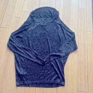 Karen Kane Size L. Sparkly, very thin Sweater. Super comfy.